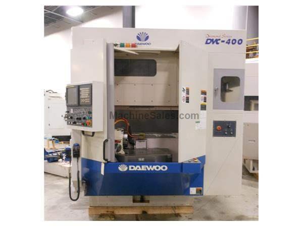 2005 - DAEWOO DCV-400 VMC WITH PALLET CHANGER, TSUDAKOMA 4TH AXIS ROTARY TABLE AND FANUC 2