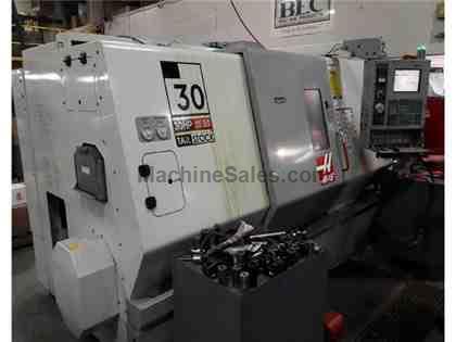 2004 HAAS MODEL SL-30 CNC LATHE WITH HAAS CONTROL, 12" CHUCK 2004 HAAS MODEL SL-30 CNC LATHE WITH HAAS CONTROL, 12" CHUCK