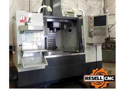 Haas VF-2 - 30"x16"x20", 8,100 RPM, 20 ATC, 2011 Haas VF-2 - 30"x16"x20", 8,100 RPM, 20 ATC, 2011
