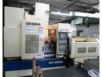 OKUMA MX-45VAE CNC VERTICAL MACHINING CENTER WITH APC NEW 1999 OKUMA MX-45VAE CNC VERTICAL MACHINING CENTER WITH APC NEW 1999