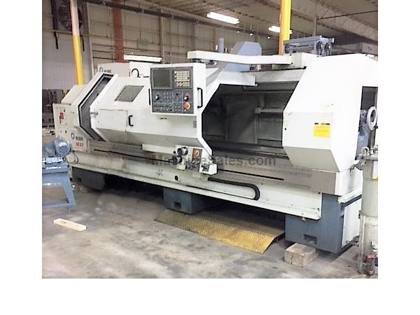 (One) Pre-Owned 27" X 120" Romi CNC Lathe M27 Fanuc 21iT Control (One) Pre-Owned 27" X 120" Romi CNC Lathe M27 Fanuc 21iT Control