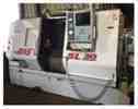 HAAS SL30T CNC TURNING CENTER W/HAAS 300 BAR FEEDER MFG:2003