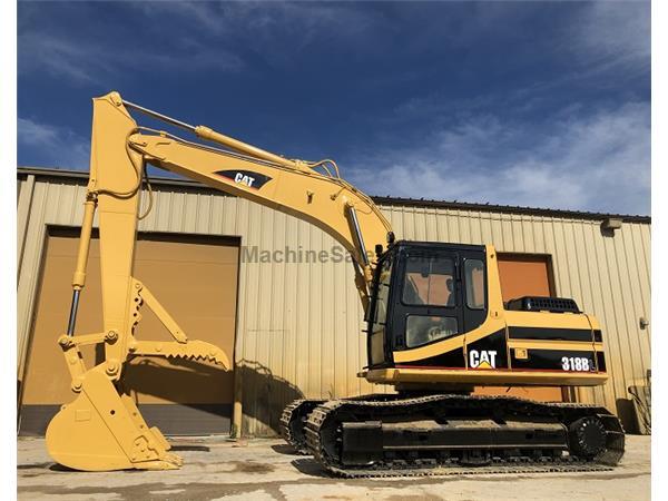 1999 Caterpillar 318BL / Enclosed Cab w/ A/C &amp; Heat - Stock Number: E71