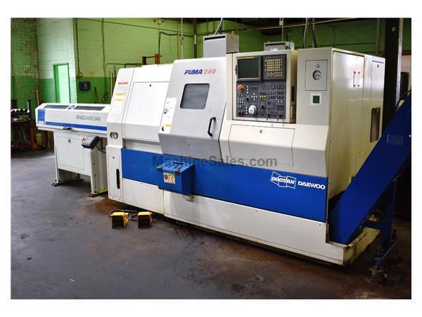 DOOSAN PUMA 240C CNC LATHE WITH SMW SPACE SAVER 2400 BARFEED DOOSAN PUMA 240C CNC LATHE WITH SMW SPACE SAVER 2400 BARFEED
