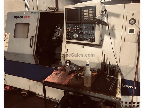 2006 Doosan Puma 300C (4" Bar) Fanuc 21iT-D Control 2006 Doosan Puma 300C (4" Bar) Fanuc 21iT-D Control
