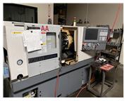2014 Okuma Genos L200E-M CNC Lathe with Live Tooling and Bar Feeder
