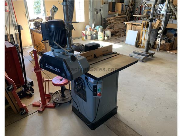 Delta 3hp shaper with one hp power feeder.