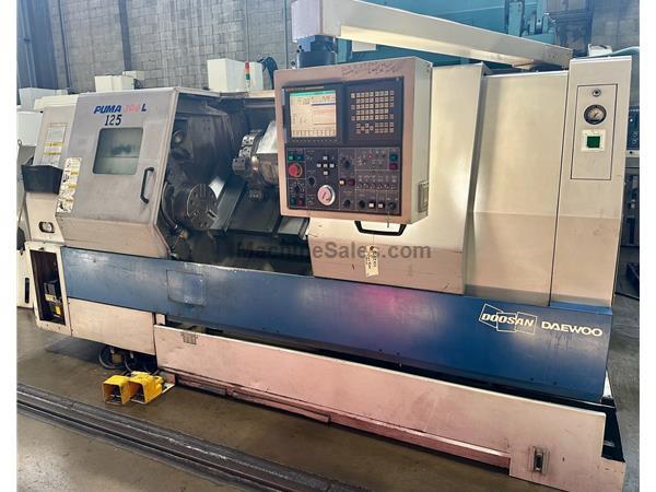 Doosan Puma 300LC CNC Lathe, Fanuc 21i-TB CNC, 23" Swing, 12" 3-J Doosan Puma 300LC CNC Lathe, Fanuc 21i-TB CNC, 23" Swing, 12" 3-J